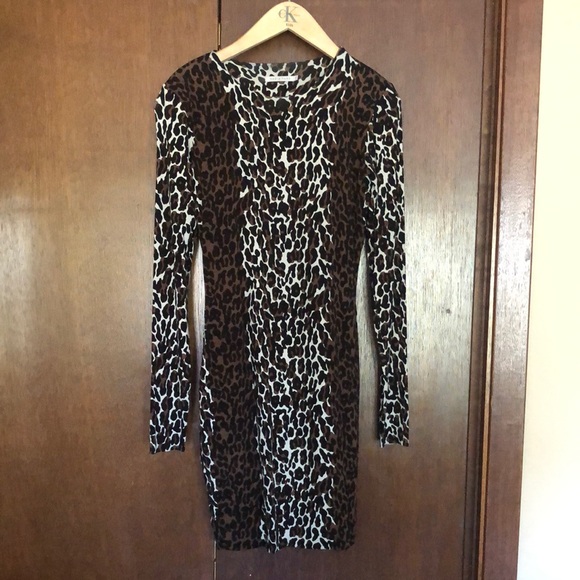 Dresses & Skirts - Nadia Tarr mid length size medium, animal print dress.